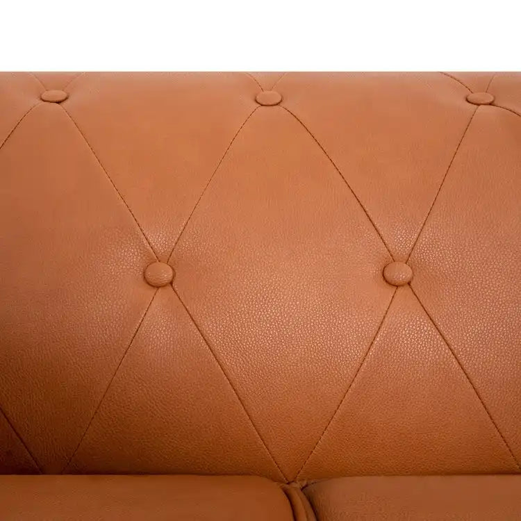 Un canapé deux places apporte une touche de luxe à un salon douillet.